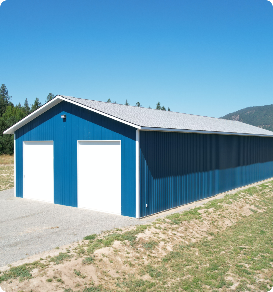 A blue and white building with two doors.